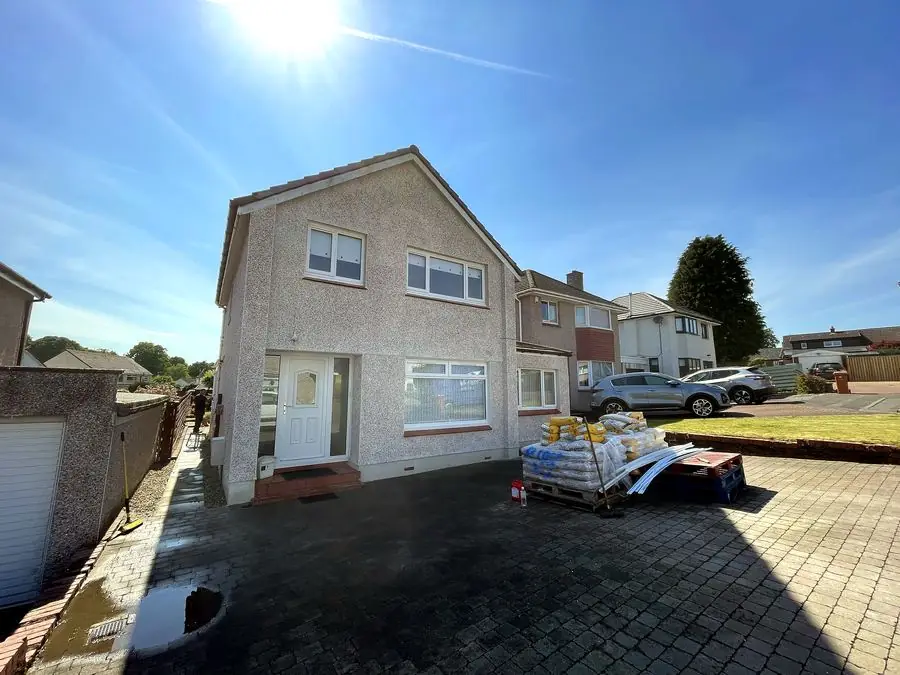 Detached house freshly roughcast in a light finish